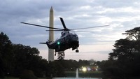 Tim dokter kepresidenan mengatakan kepada para wartawan, Trump tidak mengalami demam selama lebih dari 72 jam terakhir, dan juga tak mengeluhkan gangguan pernapasan. AP Photo/Alex Brandon  