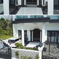 Tampak depan, rumah mewah ini didominasi palet monokrom hitam-putih. Kabarnya nilai kediaman Sang Habib ini mencapai Rp 40 miliar. Foto: Tangkapan layar YouTube/ Trans7 Official