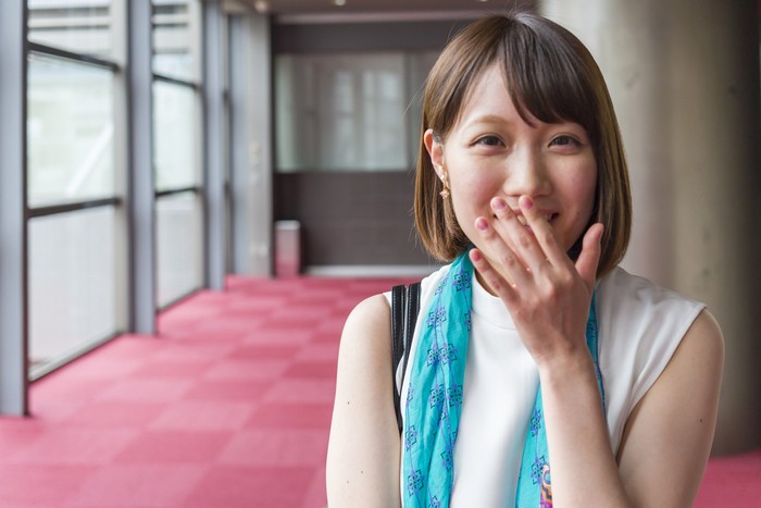 Portrait of a young Japanese business woman in a corporate office building in Kyoto Japan