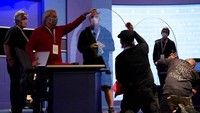 Setelah Donald Trump dan sejumlah tim suksesnya terinfeksi virus Corona, panitia debat melakukan upaya proteksi lebih ketat lagi. AP Photo/Julio Cortez  