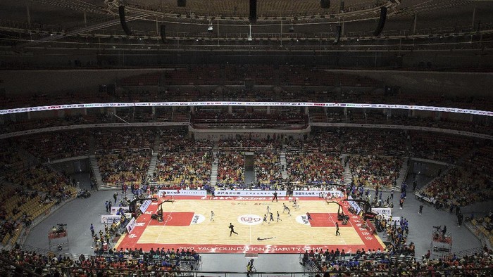 1278418116 WUHAN, CHINA - OCTOBER 04:Thousands of fans during 2020 Yao Foundation Charity tournament on October 4, 2020 in Wuhan, Hubei province, China.The tournament pits a Chinese basketball star team and against Male Dingle Star team, coached by Du Feng and Stephon Marbury respectively. China is celebrating its national day from October 1 to 8, marking the 71st anniversary of the founding of the Peoples Republic of China. As there have been no recorded cases of community transmission in Wuhan since May, life for residents is gradually returning to normal. (Photo by Getty Images)