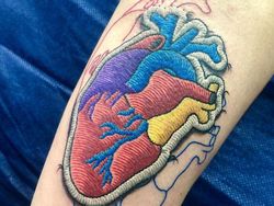 Keren! Seni Tato Seperti Bordiran Jahitan