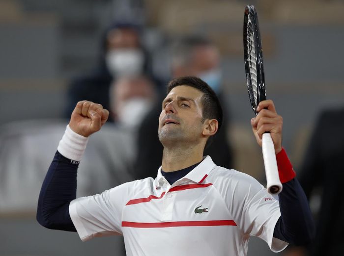 Novak Djokovic Serbias Novak Djokovic celebrates winning his the quarterfinal match of the French Open tennis tournament against Spains Pablo Carreno Busta in four sets, 4-6, 6-2, 6-3, 6-4, at the Roland Garros stadium in Paris, France, Wednesday, Oct. 7, 2020. (AP Photo/Christophe Ena)