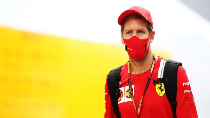 SOCHI, RUSSIA - SEPTEMBER 26: Sebastian Vettel of Germany and Ferrari walks in the Paddock before final practice ahead of the F1 Grand Prix of Russia at Sochi Autodrom on September 26, 2020 in Sochi, Russia. (Photo by Mark Thompson/Getty Images)