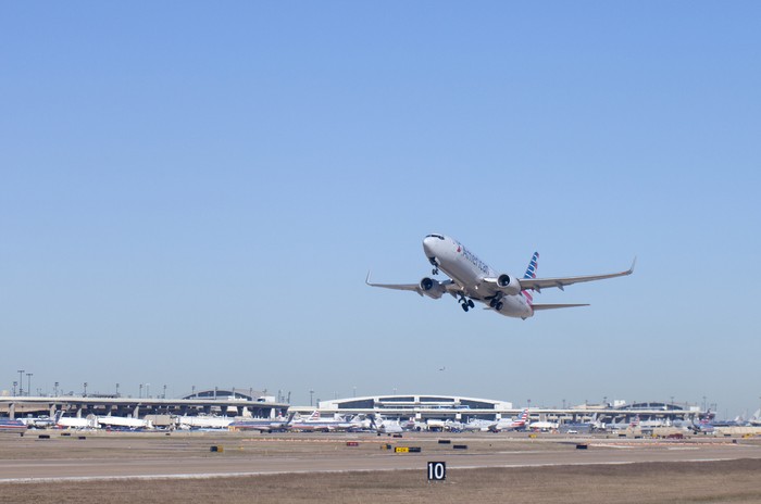 Dallas, Texas, USA - November 12, 2015:  American Airlines airplanetaking off at Dallas - Ft Worth (DFW) Airport in Texas.