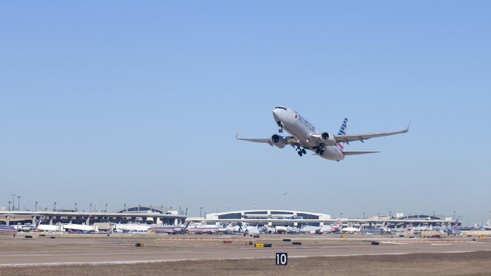 Dallas, Texas, USA - November 12, 2015:  American Airlines airplanetaking off at Dallas - Ft Worth (DFW) Airport in Texas.