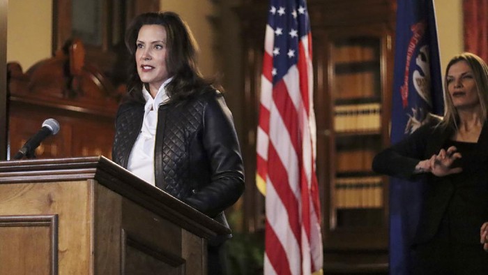 In a photo provided by the Michigan Office of the Governor, Michigan Gov. Gretchen Whitmer addresses the state during a speech in Lansing, Mich., Thursday, Oct. 8, 2020. The governor delivered remarks addressing Michiganders after the Michigan Attorney General, Michigan State Police, U.S. Department of Justice, and FBI announced state and federal charges against 13 members of two militia groups who were preparing to kidnap and possibly kill the governor. (Michigan Office of the Governor via AP)