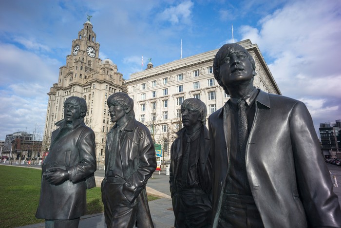LIVERPOOL, ENGLAND - FEBRUARY 11:  The recently unveiled new statues of Paul McCartney, George Harrison,  Ringo Starr and John Lennon of the Beatles stand outside the Liver Building at Liverpool Waterfront on February 11, 2016 in Liverpool, England. New research commissioned by Liverpool City Council has shown that the legacy and continued popularity of The Beatles adds GBP 81.9 million to the local economy each year and supports 2,335 jobs.  (Photo by Christopher Furlong/Getty Images)