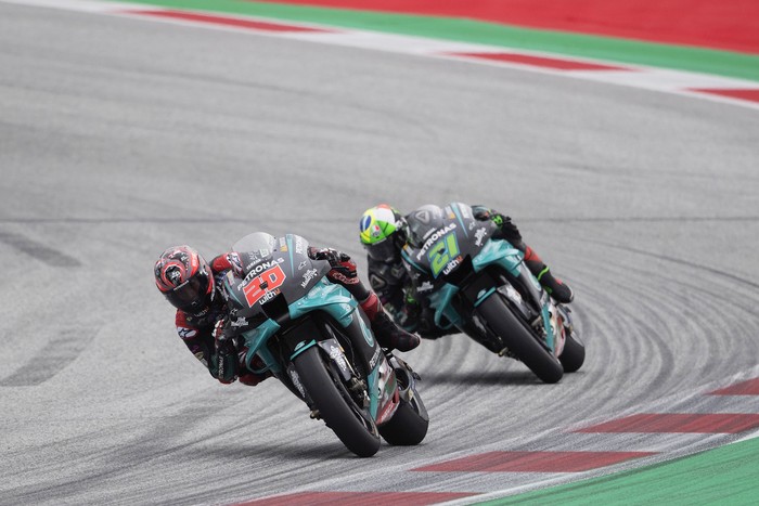 SPIELBERG, AUSTRIA - AUGUST 14:  Fabio Quartararo of France and Petronas Yamaha SRT   leads Franco Morbidelli of Italy and Petronas Yamaha SRT  during the MotoGP Of Austria - Free Practice at Red Bull Ring on August 14, 2020 in Spielberg, Austria. (Photo by Mirco Lazzari gp/Getty Images)