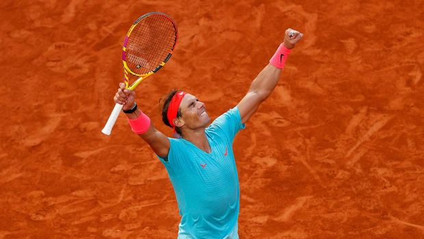 PARIS, FRANCE - OCTOBER 09: Rafael Nadal of Spain celebrates after winning match point during his Men's Singles semifinals match against Diego Schwartzman of Argentina on day thirteen of the 2020 French Open at Roland Garros on October 09, 2020 in Paris, France. (Photo by Clive Brunskill/Getty Images)