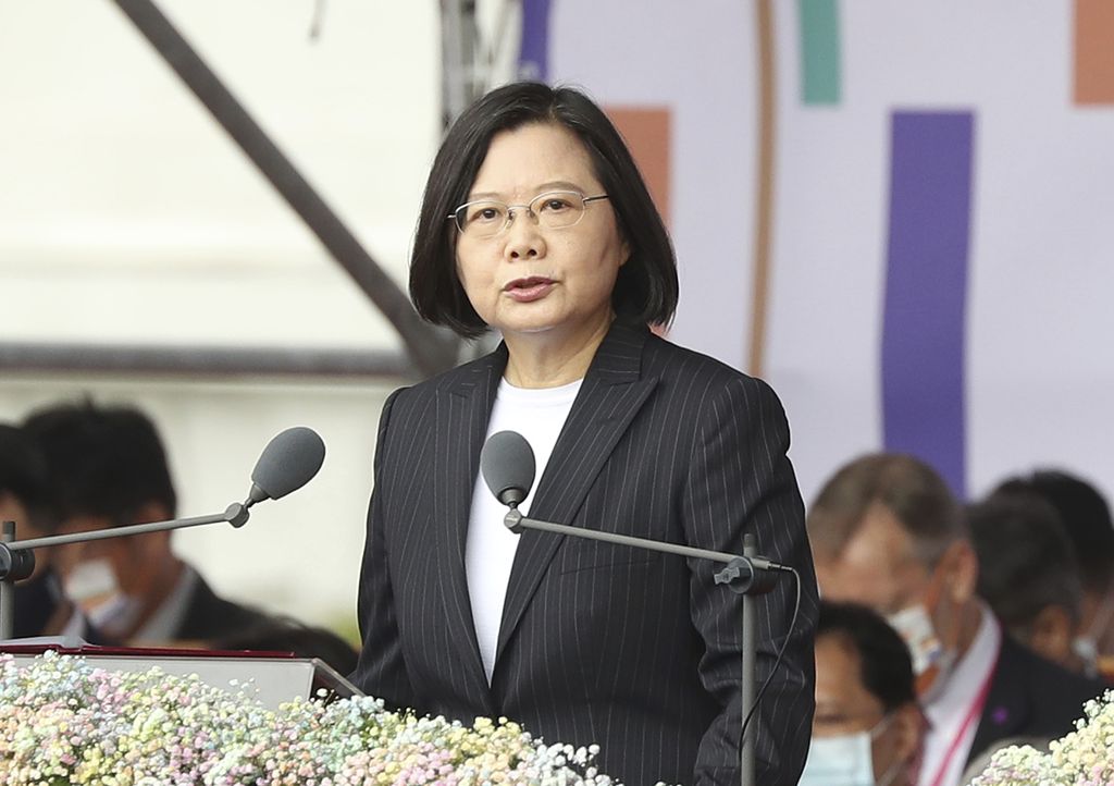 Taiwanese President Tsai Ing-wen delivers a speech during National Day celebrations in front of the Presidential Building in Taipei, Taiwan, Saturday, Oct. 10, 2020. Tsai said Saturday she has hopes for less tensions with China and in the region if Beijing will listen to Taipei's concerns, alter its approach and restart dialogue with the self-ruled island democracy. (AP Photo/Chiang Ying-ying)