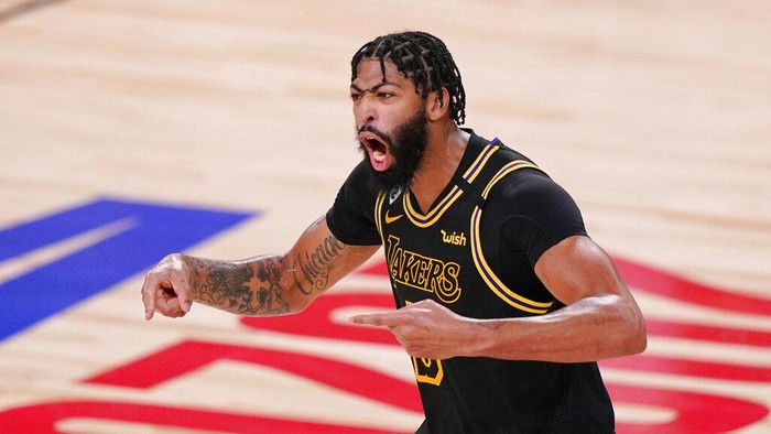 Los Angeles Lakers forward Anthony Davis celebrated during the second half in Game 5 of basketballs NBA Finals against the Miami Heat Friday, Oct. 9, 2020, in Lake Buena Vista, Fla. (AP Photo/Mark J. Terrill)