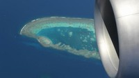 Pesawat QF787 terbang di atas kota metropolitan Australia, masuk ke Teluk Byron, Gold Coast, Great Barrrier Reef dan Uluru (Foto: CNN)