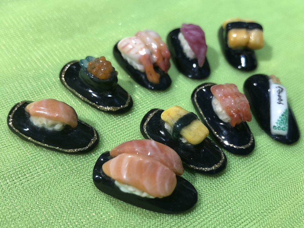 Desain Kuku Palsu Mirip Sashimi  Gurita dan Tiram