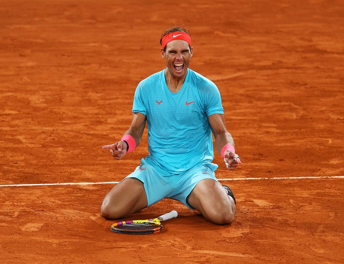 PARIS, FRANCE - OCTOBER 11: Rafael Nadal of Spain celebrates after winning championship point during his Mens Singles Final against Novak Djokovic of Serbia on day fifteen of the 2020 French Open at Roland Garros on October 11, 2020 in Paris, France. (Photo by Julian Finney/Getty Images)