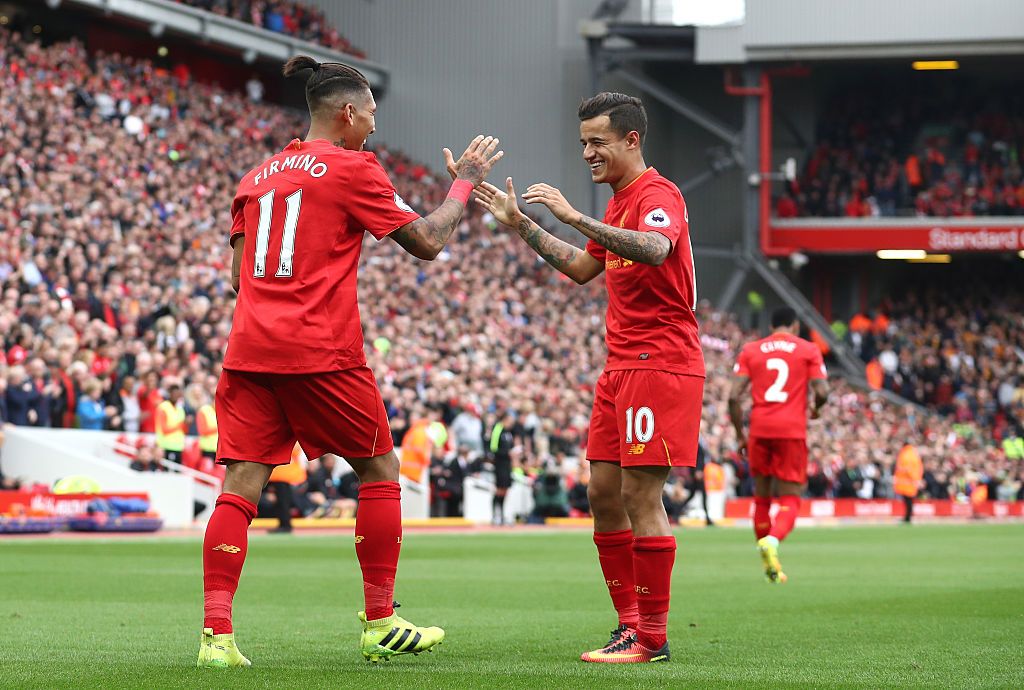 SAO PAULO, BRAZIL - OCTOBER 09: Philippe Coutinho of Brazil celebrates with Roberto Firmino after scoring the fifth goal during a match between Brazil and Bolivia as part of South American Qualifiers for Qatar 2022 at Neo Quimica Arena on October 09, 2020 in Sao Paulo, Brazil. (Photo by Buda Mendes/Getty Images)