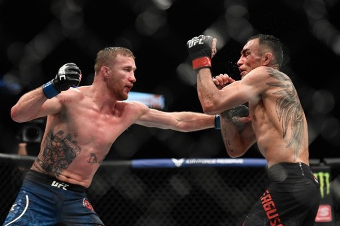 JACKSONVILLE, FL - MAY 09: Justin Gaethje (L) of the United States fights Tony Ferguson (R) of the United States in their Interim lightweight title fight during UFC 249 at VyStar Veterans Memorial Arena on May 9, 2020 in Jacksonville, Florida.   Douglas P. DeFelice/Getty Images/AFP