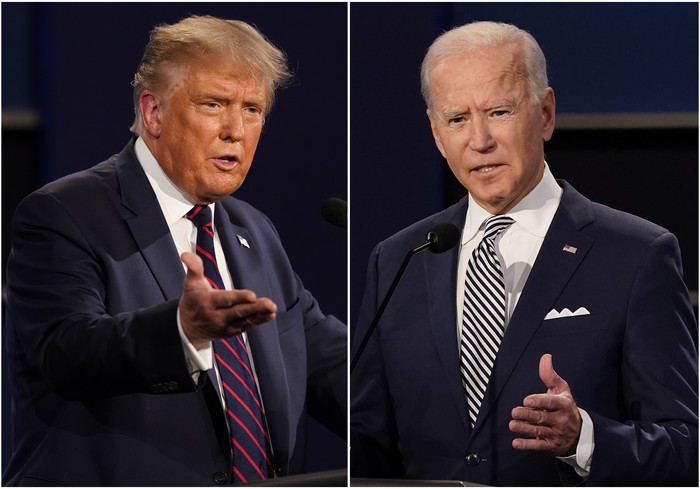 Donald Trump dan Joe Biden FILE - This combination of Sept. 29, 2020, file photos shows President Donald Trump, left, and former Vice President Joe Biden during the first presidential debate at Case Western University and Cleveland Clinic, in Cleveland, Ohio. Amid the tumult of the 2020 presidential campaign, one dynamic has remained constant: The Nov. 3 election offers voters a choice between substantially different policy paths. (AP Photo/Patrick Semansky, File)