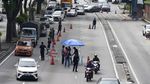 Foto Populer Sepekan: Hamas-Israel Gencatan Senjata & Singapura Lockdown
