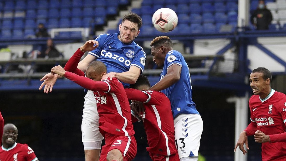 Laga Liverpool vs Everton akan tersaji di pekan ke-25 Liga Inggris, Minggu (22/2/2021) dini hari WIB. (Foto: Cath Ivill/AP)