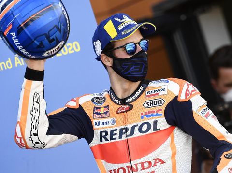 Alex Marquez Honda rider Alex Marquez, of Spain, celebrates on the podium his third place in the Aragon Motorcycle Grand Prix at the Motorland circuit in Alcaniz, Spain, Sunday, Oct. 18, 2020. (AP Photo/Jose Breton)