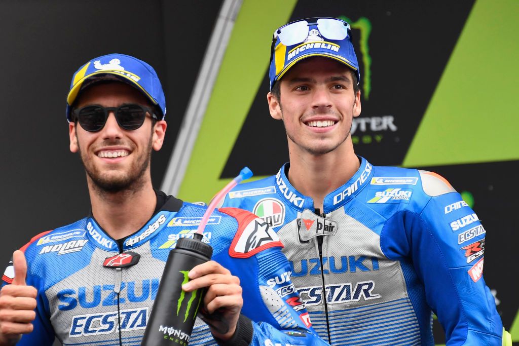BARCELONA, SPAIN - SEPTEMBER 27: Alex Rins of Spain and Team Suzuki ECSTAR and Joan Mir of Spain and Team Suzuki ECSTAR (R) celebrate under the podium the podium at the end of the MotoGP race during the MotoGP of Catalunya: Race during the MotoGP of Catalunya at Circuit de Barcelona-Catalunya on September 27, 2020 in Barcelona, Spain. (Photo by Mirco Lazzari gp/Getty Images)