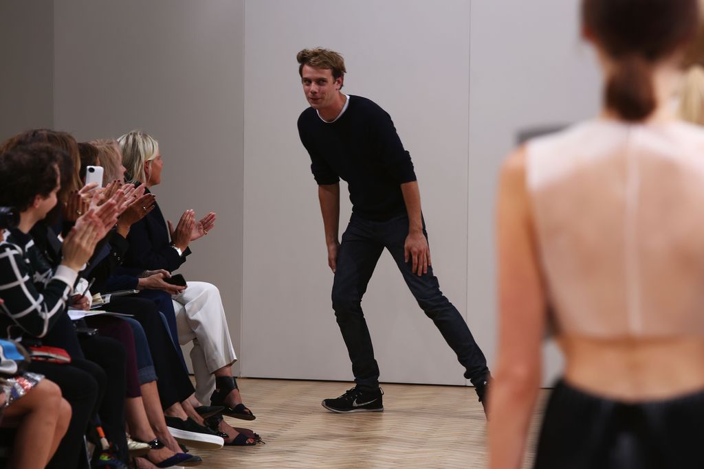 LONDON, ENGLAND - SEPTEMBER 14:  Designer J.W. Anderson acknowledges the audience after the J.W. Anderson show during London Fashion Week SS14 on September 14, 2013 in London, England.  (Photo by Tim P. Whitby/Getty Images)