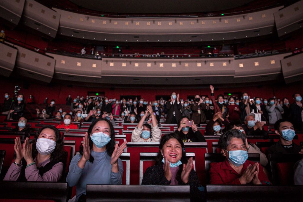 WUHAN, CHINA - OCTOBER 18: (CHINA OUT) The cast play nurses as they perform on stage during the opera 