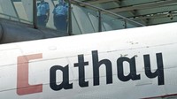 Cathay telah menerapkan program cuti yang tidak dibayar untuk staf di awal tahun karena kerugian bulanan meningkat hingga HK $ 3 miliar, dan memotong gaji dan menutup basis kru di luar negeri. AP Photo/Kin Cheung.