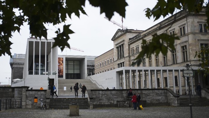 The main entrance to the Museums Island and the Neue Museum, left, in Berlin, Wednesday, Oct. 21, 2020. A large number of art works and artifacts at some of Berlins best-known museums were smeared with a liquid by an unknown perpetrator or perpetrators earlier this month, police said Wednesday. The numerous works in several museums at the Museum Island complex, a UNESCO world heritage site in the heart of the German capital that is one of the citys main tourist attractions, were targeted between 10 a.m. and 6 p.m. on Oct. 3, police said. (AP Photo/Markus Schreiber)