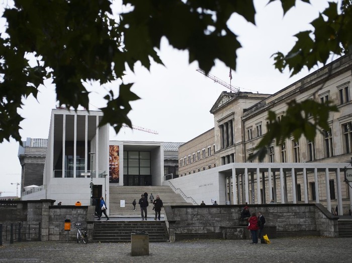 The main entrance to the Museums Island and the Neue Museum, left, in Berlin, Wednesday, Oct. 21, 2020. A large number of art works and artifacts at some of Berlins best-known museums were smeared with a liquid by an unknown perpetrator or perpetrators earlier this month, police said Wednesday. The numerous works in several museums at the Museum Island complex, a UNESCO world heritage site in the heart of the German capital that is one of the citys main tourist attractions, were targeted between 10 a.m. and 6 p.m. on Oct. 3, police said. (AP Photo/Markus Schreiber)