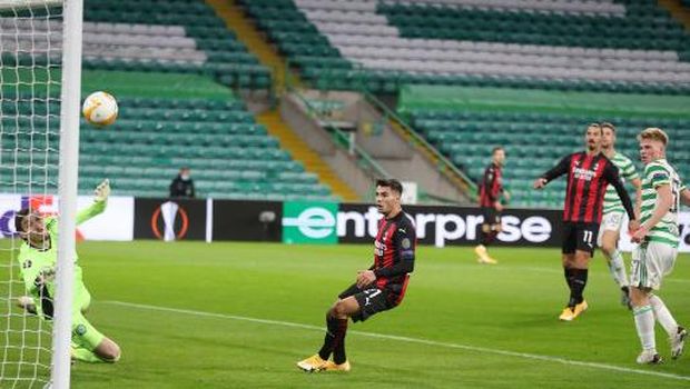 AC Milan's Bosnian midfielder Rade Krunic (unseen) scores his team's first goal during the UEFA Europa League 1st round group H football match between Celtic and AC Milan at Celtic Park stadium in Glasgow, Scotland on October 22, 2020. - sch (Photo by RUSSELL CHEYNE / POOL / AFP)
