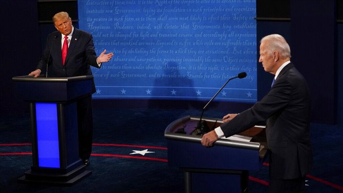 Democratic presidential candidate former Vice President Joe Biden points toward President Donald Trump during the second and final presidential debate Thursday, Oct. 22, 2020, at Belmont University in Nashville, Tenn. (AP Photo/Morry Gash, Pool)