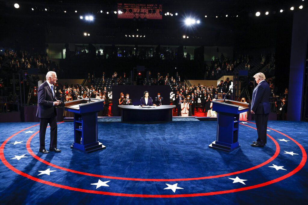Democratic presidential candidate former Vice President Joe Biden points toward President Donald Trump during the second and final presidential debate Thursday, Oct. 22, 2020, at Belmont University in Nashville, Tenn. (AP Photo/Morry Gash, Pool)