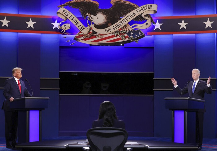 Democratic presidential candidate former Vice President Joe Biden points toward President Donald Trump during the second and final presidential debate Thursday, Oct. 22, 2020, at Belmont University in Nashville, Tenn. (AP Photo/Morry Gash, Pool)