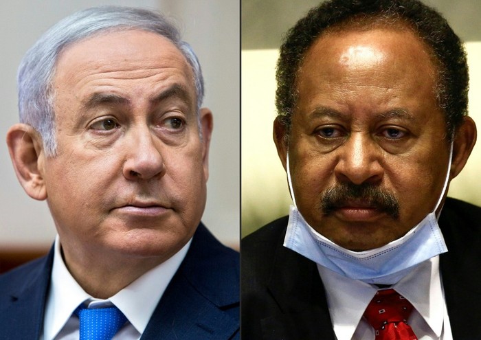 (COMBO) This combination of pictures created on October 24, 2020 shows (L to R) Israeli Prime Minister Benjamin Netanyahu during a cabinet meeting in Jerusalem on July 29, 2018; and Sudans Prime Minister Abdullah Hamduk during a meeting in the capital Khartoum on July 26, 2020. - Sudan and Israel agreed on Otober 23 to normalise relations, in a US-brokered deal to end decades of hostility that was widely welcomed but stirred Palestinian anger. The announcement makes Sudan, technically at war with Israel since its 1948 foundation, the fifth Arab country to forge diplomatic relations with the Jewish state. (Photos by Sebastian Scheiner and ASHRAF SHAZLY / various sources / AFP)