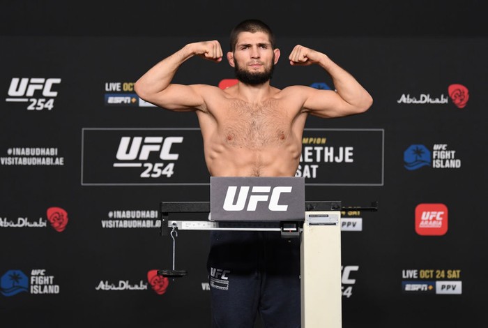 ABU DHABI, UNITED ARAB EMIRATES - OCTOBER 23: In this handout image provided by UFC, Khabib Nurmagomedov of Russia poses on the scale during the UFC 254 weigh-in on October 23, 2020 on UFC Fight Island, Abu Dhabi, United Arab Emirates. (Photo by Josh Hedges/Zuffa LLC via Getty Images)