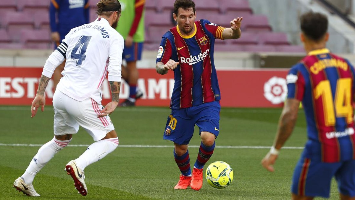 Lionel Messi dan Sergio Ramos diisukan mau cabut dari Liga Spanyol. (Foto: Joan Monfort/AP)