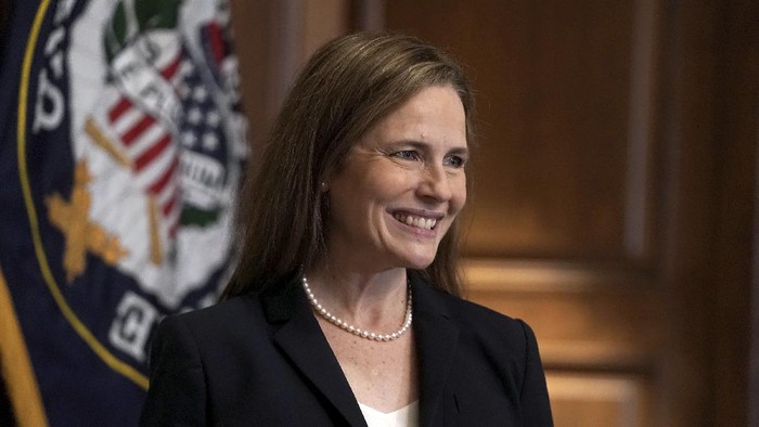 Supreme Court nominee Amy Coney Barrett, meets with Sen. Martha McSally, R-Ariz., Wednesday, Oct. 21, 2020, on Capitol Hill in Washington. (Greg Nash/Pool via AP)