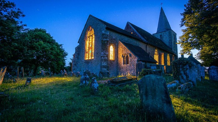 St Nicholas Church at midnight in Pluckley village, the most haunted village in England