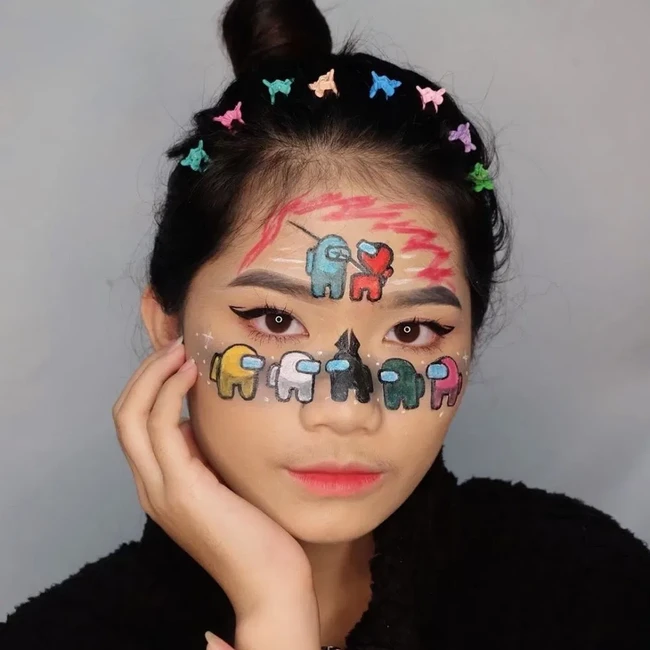 Belakangan game Among Us diminati banyak orang. Beauty influencer Aurelia Siregar pun terinspirasi membuat makeup dari karakter Among Us. Sungguh unik! Foto: Instagram