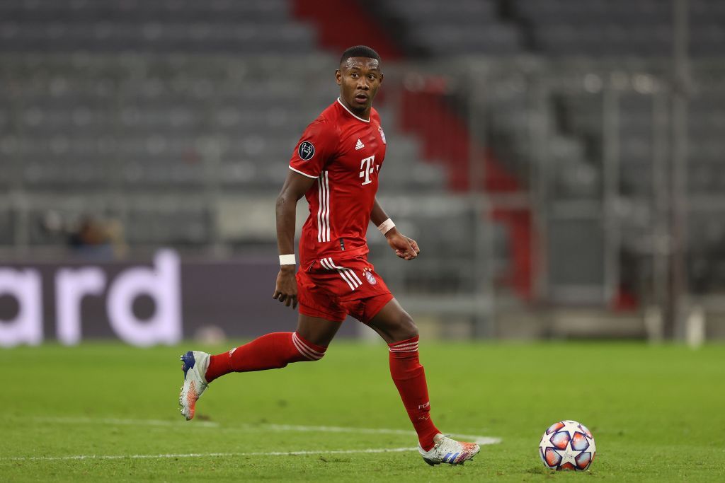 MUNICH, GERMANY - OCTOBER 21: David Alaba of FC Bayern München runs with the ball during the UEFA Champions League Group A stage match between FC Bayern Muenchen and Atletico Madrid at Allianz Arena on October 21, 2020 in Munich, Germany. (Photo by Alexander Hassenstein/Getty Images)