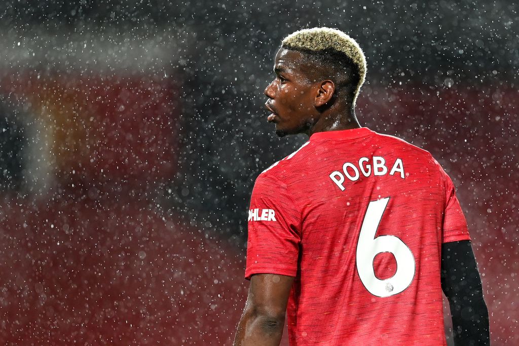 Pogba MANCHESTER, ENGLAND - OCTOBER 24: Paul Pogba of Manchester United looks on during the Premier League match between Manchester United and Chelsea at Old Trafford on October 24, 2020 in Manchester, England. Sporting stadiums around the UK remain under strict restrictions due to the Coronavirus Pandemic as Government social distancing laws prohibit fans inside venues resulting in games being played behind closed doors. (Photo by Michael Regan/Getty Images)