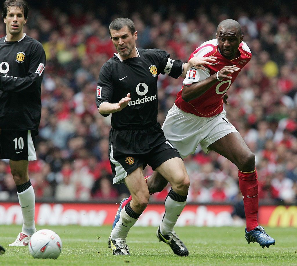 Roy Keane, Patrick Viera CARDIFF, WALES - MAY 21: Patrick Vieira of Arsenal and Roy Keane of Manchester United battle for the ball during the FA Cup Final between Arsenal and Manchester United at The Millennium Stadium on May 21, 2005 in Cardiff, Wales. (Photo by Phil Cole/Getty Images)