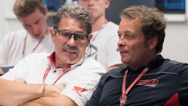 ASSEN, NETHERLANDS - JULY 01:  Carlo Fiorani of Italy and HRC Communications Director  (L) speaks Emilio Alzamora of Spain and Repsol Honda Team during the press conference at the end of the MotoGp race during the MotoGP Netherlands - Race on July 1, 2018 in Assen, Netherlands.  (Photo by Mirco Lazzari gp/Getty Images)