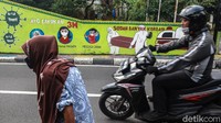 Mural ini menggambarkan akan bahaya COVID-19.