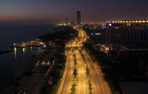 An aerial view shows deserted streets in the Saudi coastal city of Jeddah on April 21, 2020, during the novel coronavirus pandemic crisis. (Photo by Bandar al-DANDANI / AFP)