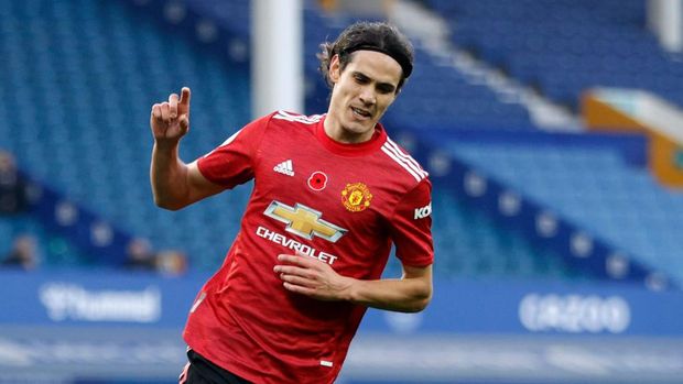 Edinson Cavani LIVERPOOL, ENGLAND - NOVEMBER 07: Edinson Cavani of Manchester United celebrates after scoring his team's third goal during the Premier League match between Everton and Manchester United at Goodison Park on November 07, 2020 in Liverpool, England. Sporting stadiums around the UK remain under strict restrictions due to the Coronavirus Pandemic as Government social distancing laws prohibit fans inside venues resulting in games being played behind closed doors. (Photo by Clive Brunskill/Getty Images)
