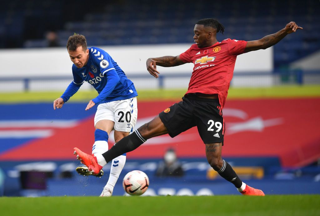 Everton Vs Manchester United LIVERPOOL, ENGLAND - NOVEMBER 07: Michael Keane of Everton competes for a header with Anthony Martial of Manchester United during the Premier League match between Everton and Manchester United at Goodison Park on November 07, 2020 in Liverpool, England. Sporting stadiums around the UK remain under strict restrictions due to the Coronavirus Pandemic as Government social distancing laws prohibit fans inside venues resulting in games being played behind closed doors. (Photo by Paul Ellis - Pool/Getty Images)
