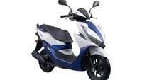 Honda NX125 dilengkapi dengan garpu depan teleskopik, monosok belakang, dan pelek depan 12 inci, serta pelek belakang 10 inci. Sistem pengereman skutik ini menggunakan cakram di depan dan teromol di belakang. Keduanya diatur oleh sistem pengereman kombi brake (CBS). Foto: Rushlane